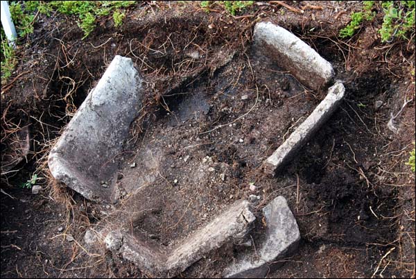 Soapstone pot exposed during excavation at Indian Harbour, 2009