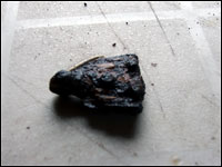 Riveted iron and bone artifact