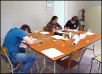 Local students cataloguing artifacts from Indian Harbour in the labin Cartwright