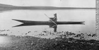 Mrs. Cotter kayaking on the North West River, Hamilton Inlet, Labrador, NL, 1909