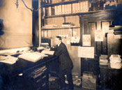 Man in Job Brothers & Co. insurance office