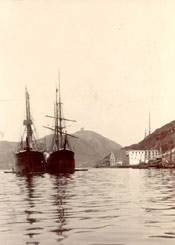 Two unidentified vessels moored in St. John's harbour with Signal Hill in the background