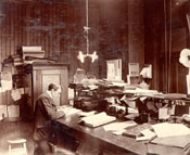 A man sitting at a desk, Job Brothers & Co.