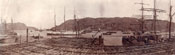 Panorama of St. John's harbour with fish flakes in the foreground