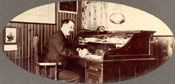 Mr. A. MacPherson at his desk