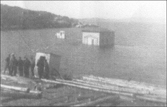 George and Jane Pickett house being towed from Fair Island to Centreville, Bonavista Bay
