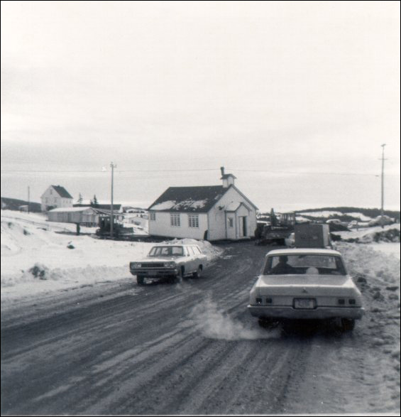 The Church of St. Mary the Virgin, moved from St. Joseph's to Marystown, being towed up the road