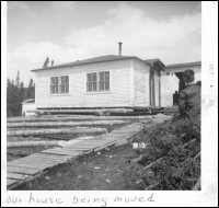 Gordon and Evelyn Lethbridge house being prepared for the move from Paradise River to Cartwright, Labrador