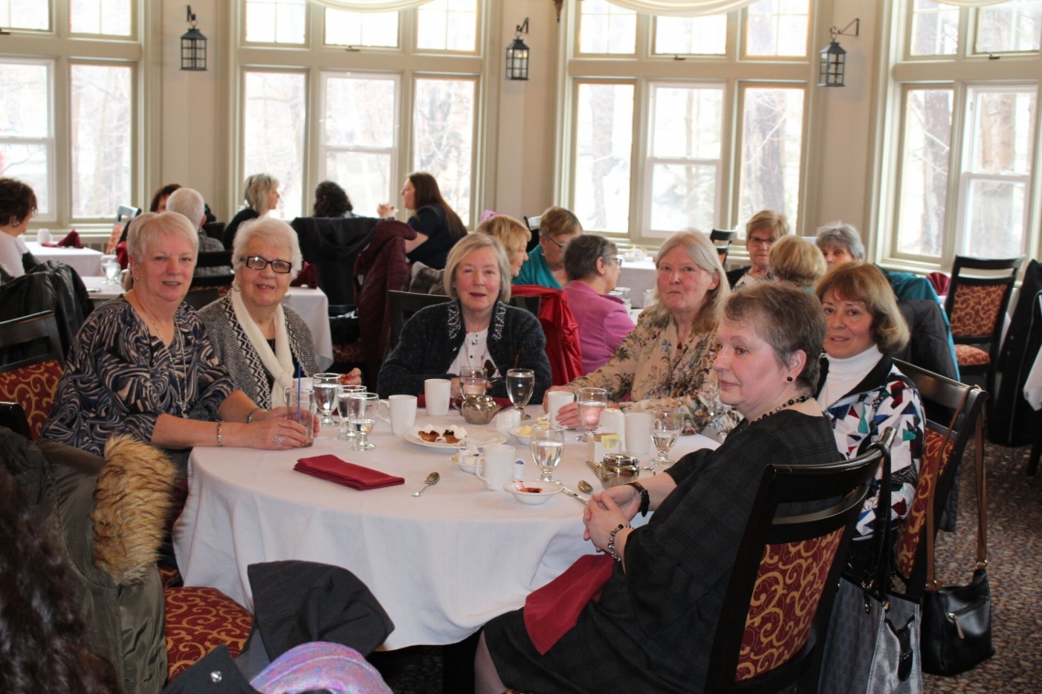 Beneficiaries seated in Glynmill Inn dining room