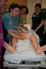 Nursing students work with Noelle as part of their clinical training