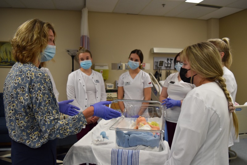 Nursing students learn the science and art of practice.