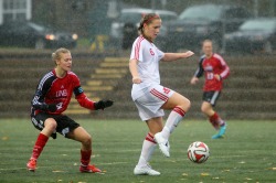 Jessie Noseworthy (centre) scores big against UNB and leads her team to national finals. Photo by Nick Pearce