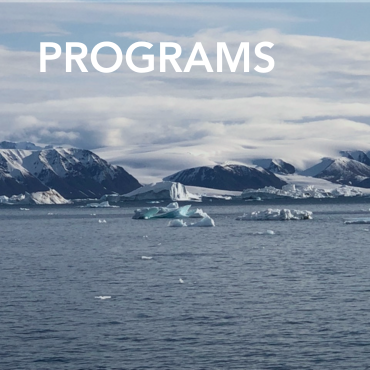 A picture of mountains and icebergs with the ocean in the foreground, with the word Programs written on top