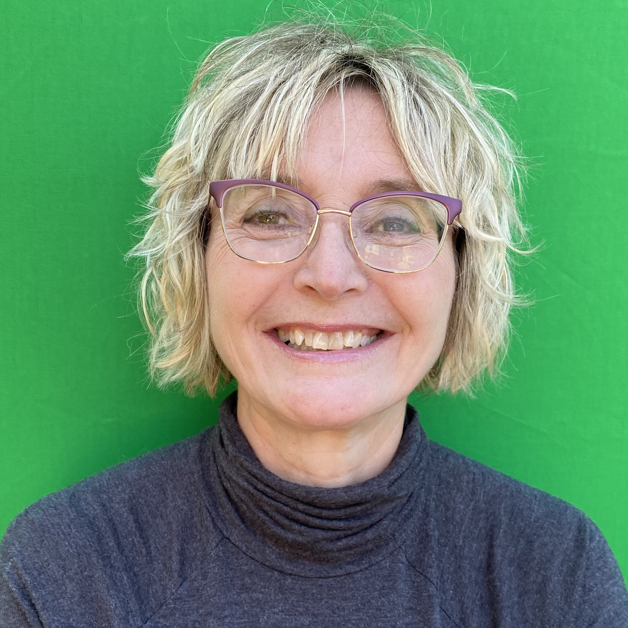 Dr. Leslie Phillips - green background - square