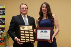 Adrienne Penney receives the Erin Bursey Memorial Award two weeks ago. She received the national equivalent of this award today.