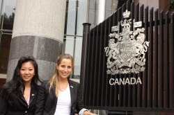 Jasmine Elliott (R) in front of the Canadian Embassy in Beijing.