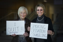 Dr. Leslie Phillips (right) helps a patient quit smoking.