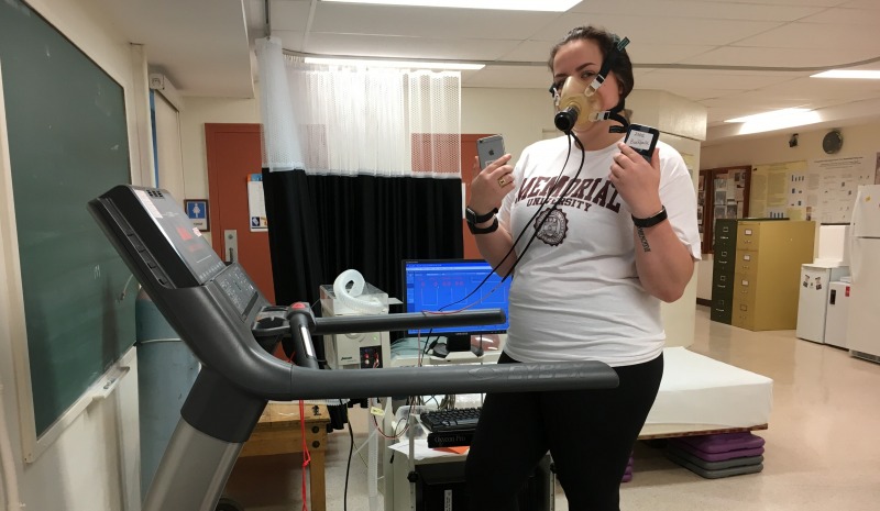 Kassia Orychock, a M.Sc. student in HKR, is connected to a metabolic cart testing the reliability and validity of wearable devices, such as Fitbits and Apple Watches.

