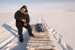 Andrew Arreak with the SmartQuamutik ice sensor on his sled.

