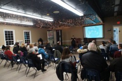 Photograph of the public meeting about research results in Petty Harbour.