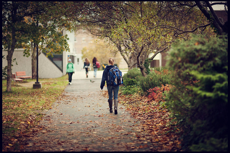 student walking on campus