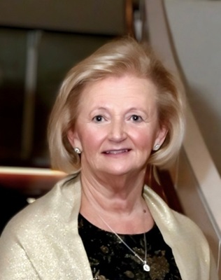 Image of VP Finance and Administration Trudy Pound-Curtis wearing a black top with a gold coloured shawl.